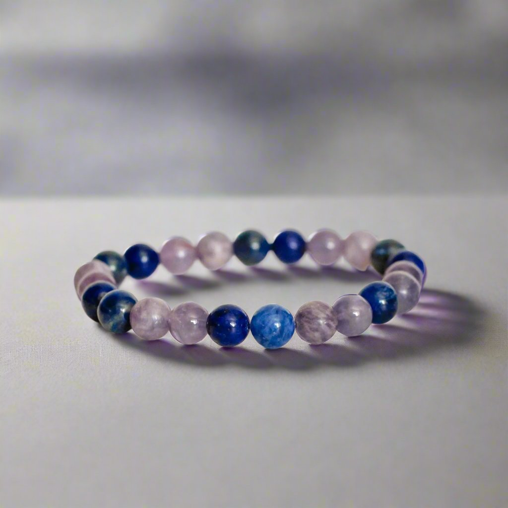 Anti-Siam Healing Bracelet with the best healing crystals for anxiety, sodalite, amethyst, lapis lazuli, and lepidolite stones for anxiety relief and emotional balance, making it perfect for spiritual gifts. 