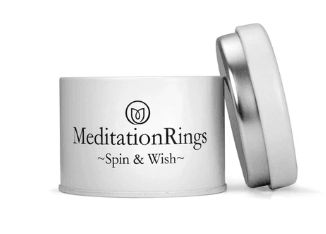 Bold Sterling Silver Spinner Ring with Yellow Gold spinning band, displayed with complimentary MeditationRings Tin and Travel Pouch